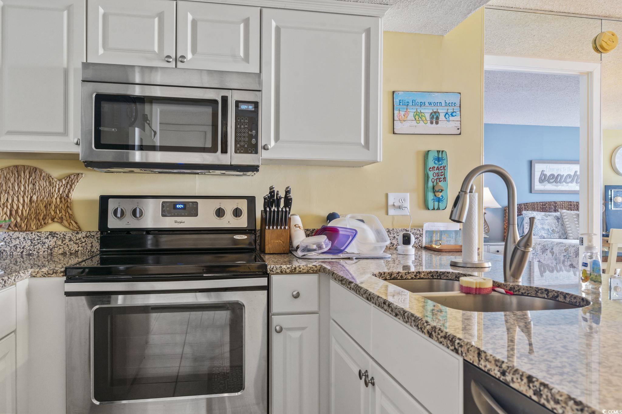 9820 Queensway Boulevard, Unit 1005 Myrtle Beach, SC 29572 - Photo 9 of 24 Kitchen with appliances with stainless steel finis