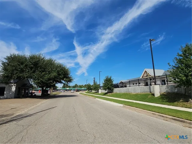 a view of a street with houses