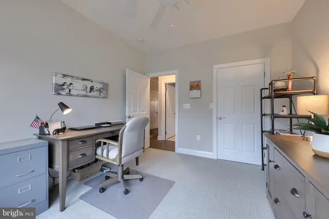 a view of a kitchen counter space dining room and wooden floor