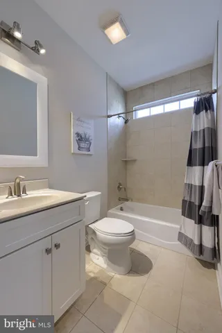 a kitchen with granite countertop a sink and a window