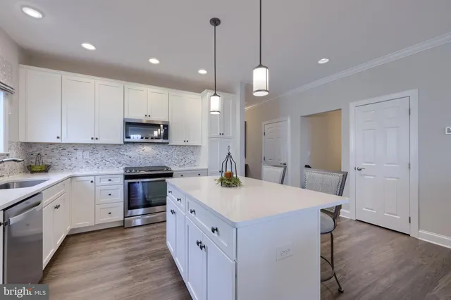 a dining room with furniture window wooden floor