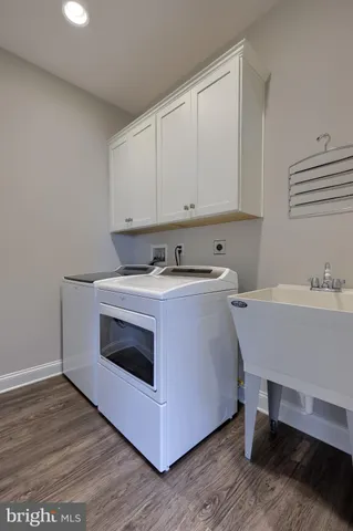 a spacious bedroom with a bed and furniture