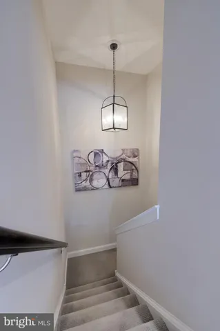 a bathroom with a toilet a sink and shower