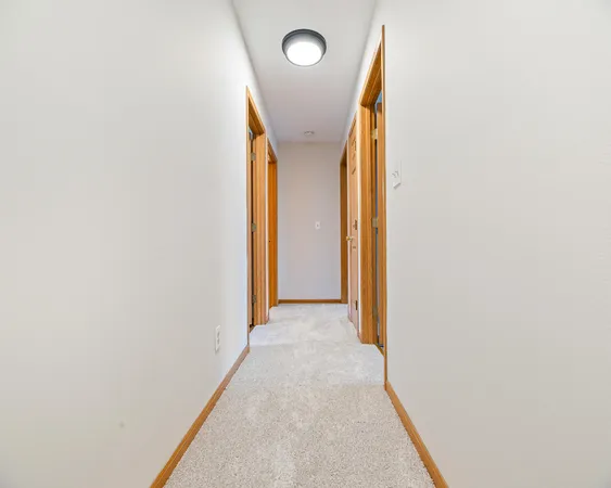 a view of a door with a hallway