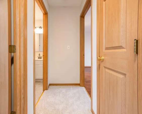 a view of a bathroom with shower and a window