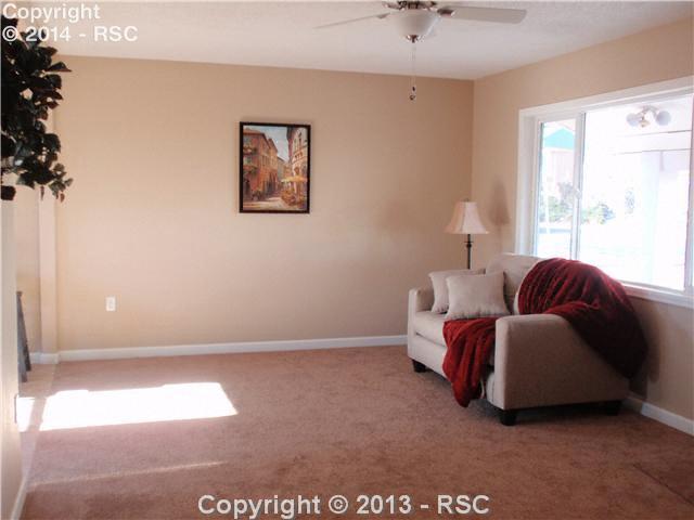 409 East Cheyenne Road Colorado Springs, CO 80905 - Photo 6 of 13 Complete New Paint In Neutral Colors. New Windows Too!