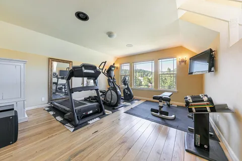 a view of a room with gym equipment