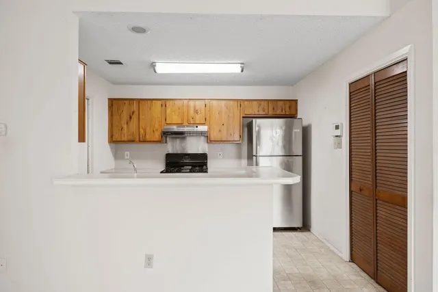 a stove top oven sitting inside of a kitchen stove