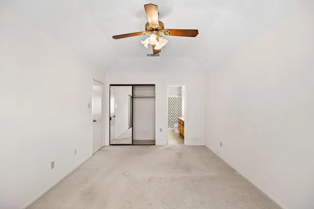 a bathroom with a tub and a sink
