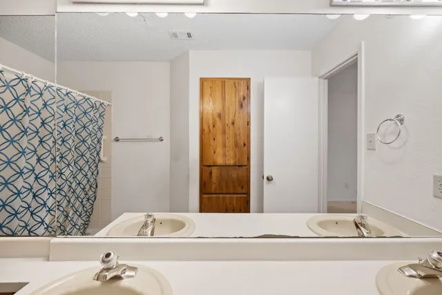 a view of a hallway with elevator