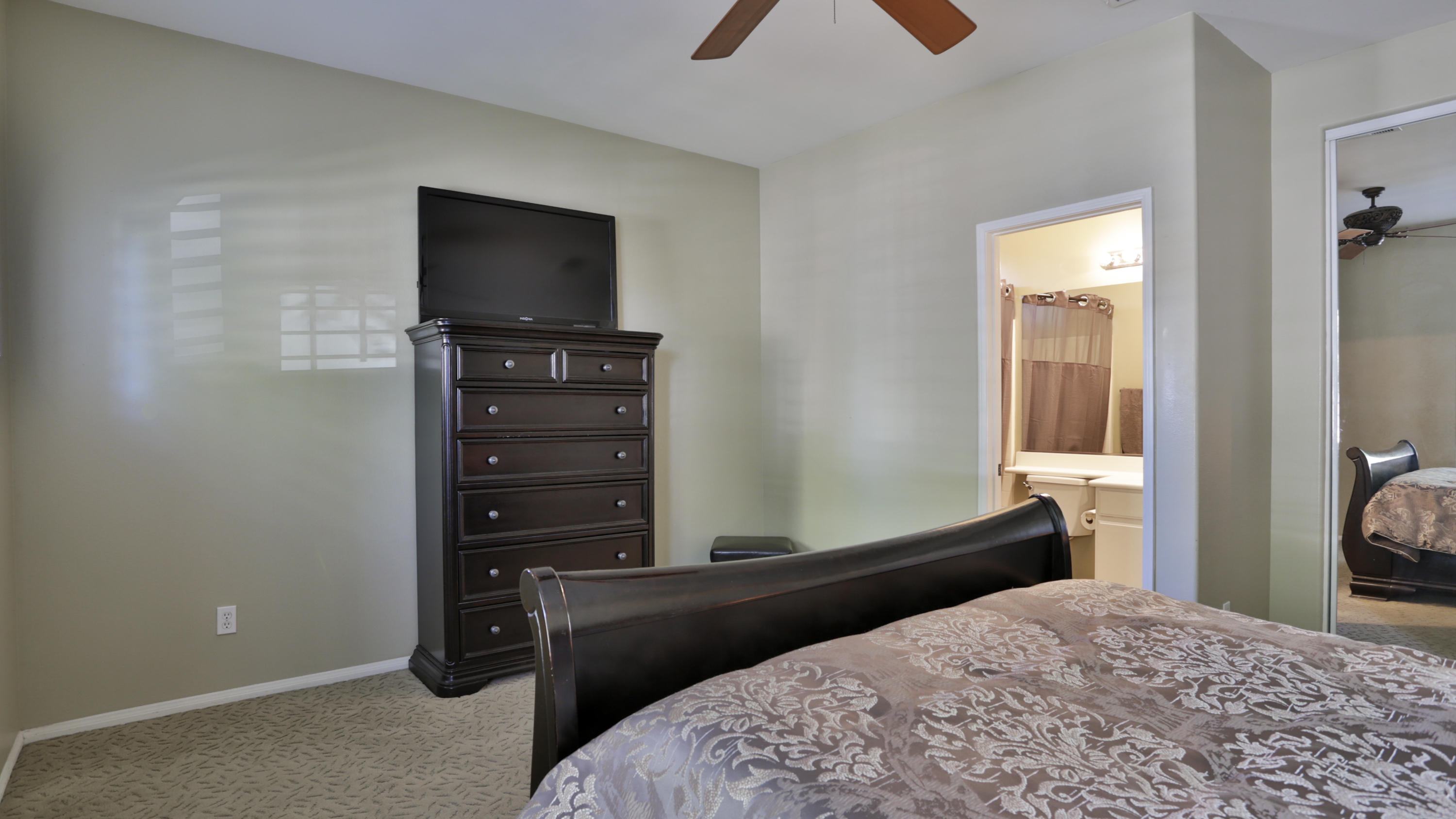 1598 Thunderbird Road Beaumont, CA 92223 - Photo 26 of 52 a bedroom with a bed and a television