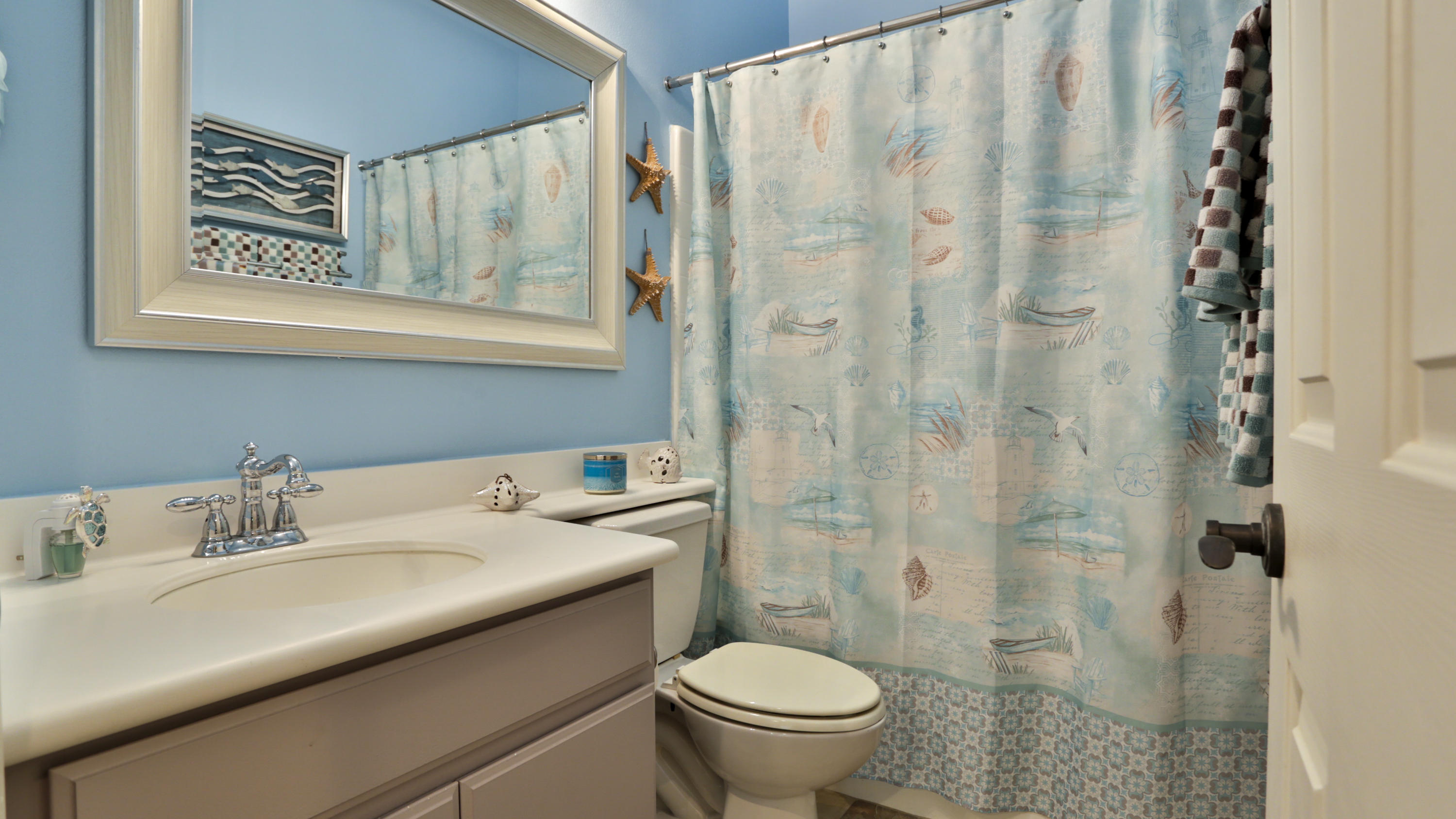 1598 Thunderbird Road Beaumont, CA 92223 - Photo 30 of 52 a bathroom with a sink toilet and shower