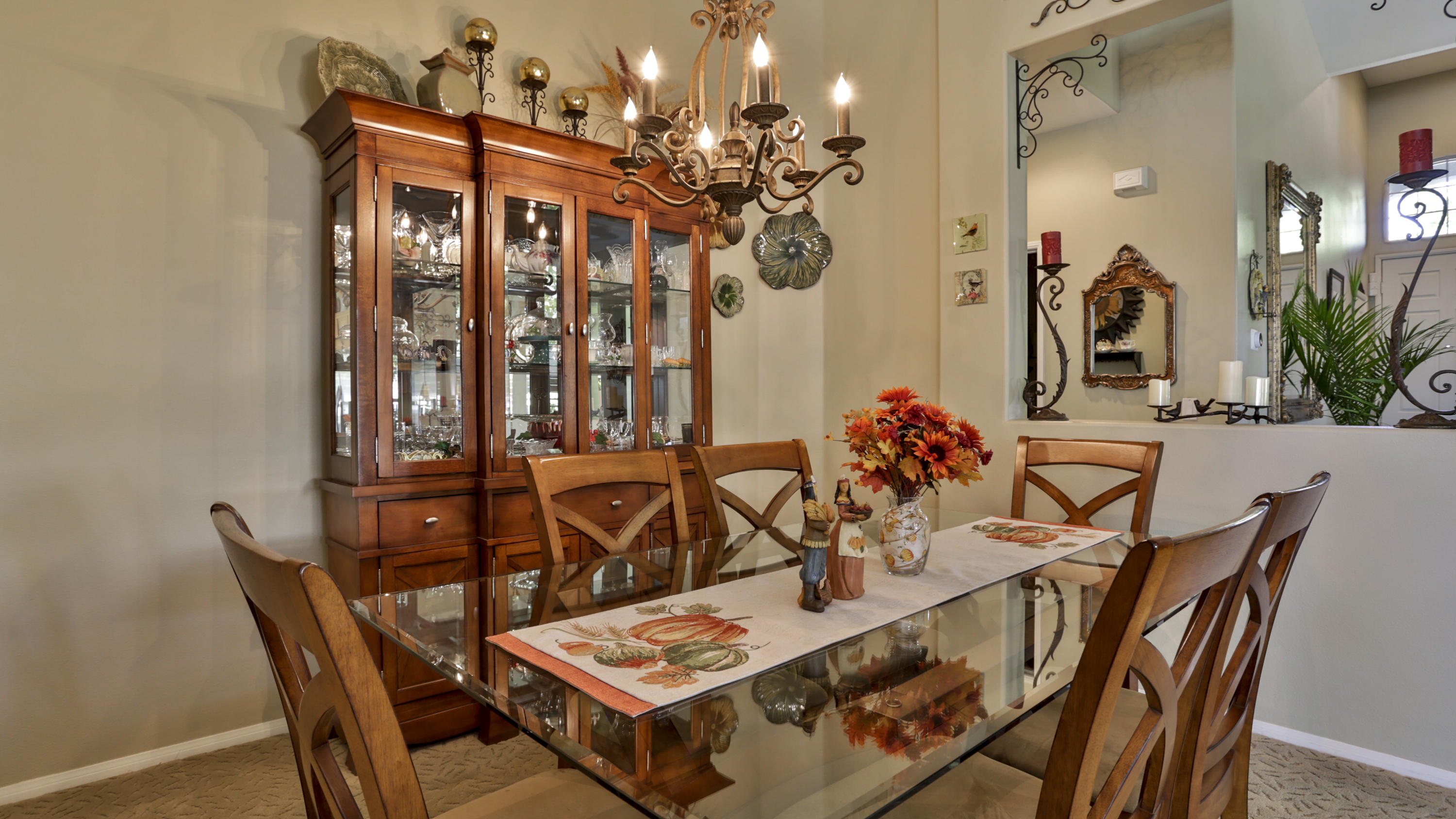 1598 Thunderbird Road Beaumont, CA 92223 - Photo 4 of 52 a view of a dining room with furniture and chandelier