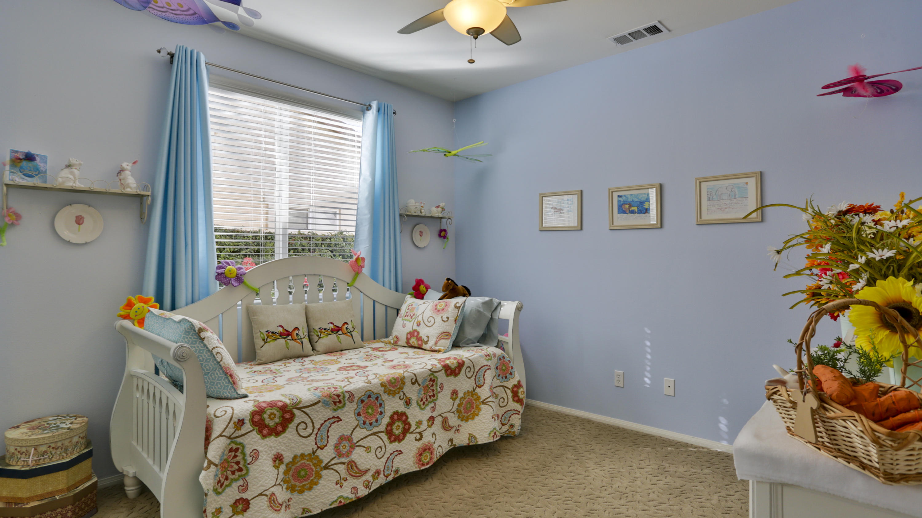 1598 Thunderbird Road Beaumont, CA 92223 - Photo 31 of 52 a bed sitting in a bedroom next to a window