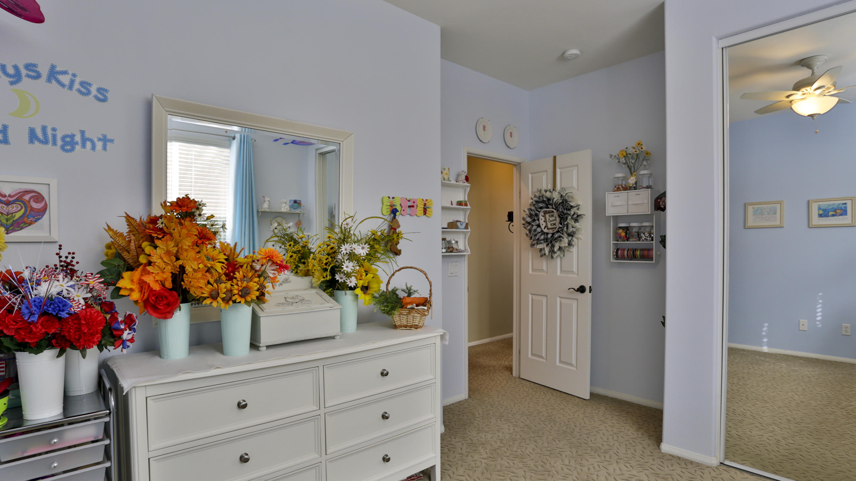 1598 Thunderbird Road Beaumont, CA 92223 - Photo 32 of 52 a room that has a dresser and a potted plant