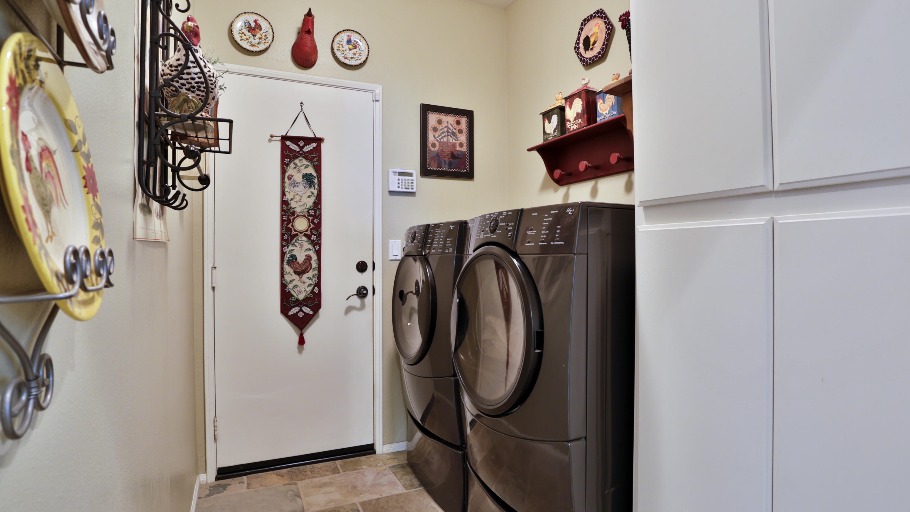 1598 Thunderbird Road Beaumont, CA 92223 - Photo 34 of 52 a utility room with multiple dryer and washer