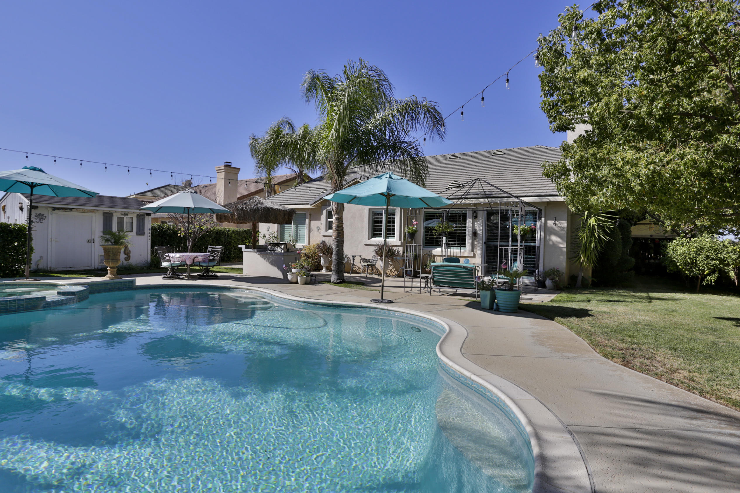 1598 Thunderbird Road Beaumont, CA 92223 - Photo 38 of 52 a swimming pool view with a seating space and a garden