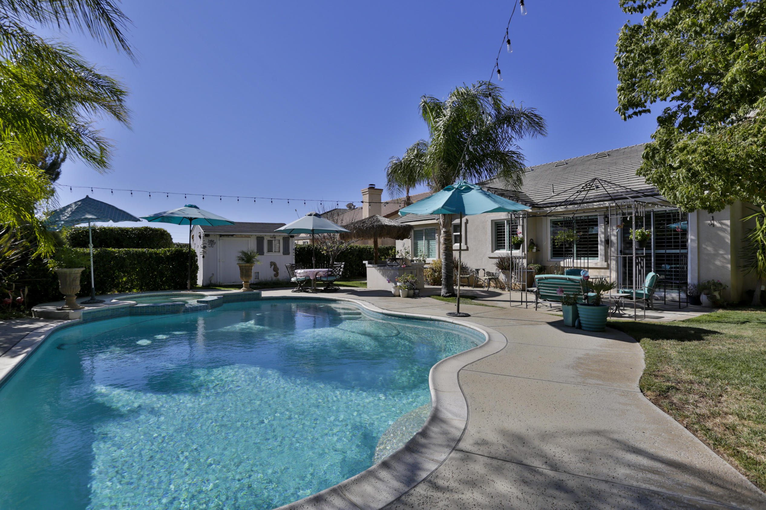 1598 Thunderbird Road Beaumont, CA 92223 - Photo 39 of 52 a swimming pool view with a seating space and a garden