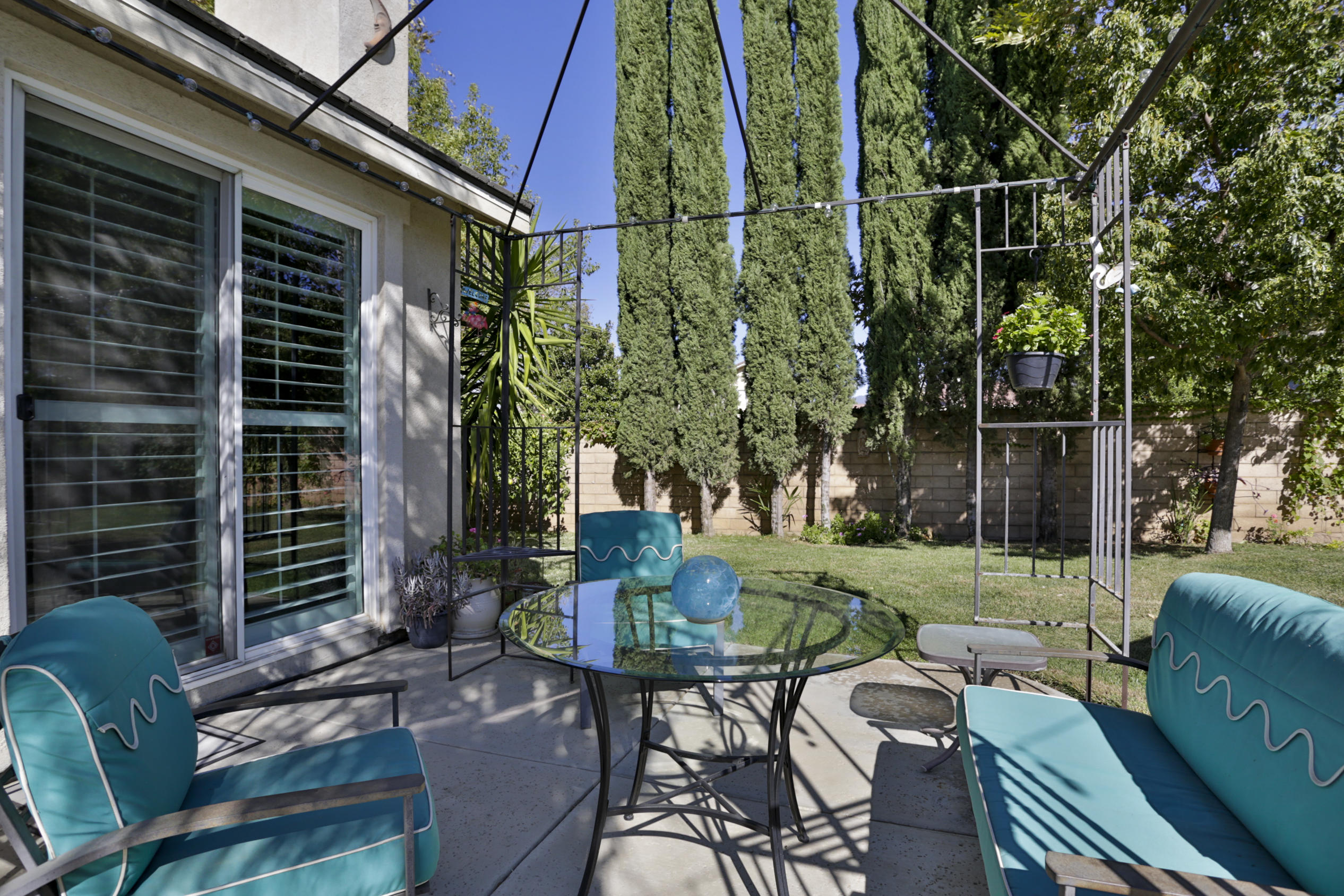 1598 Thunderbird Road Beaumont, CA 92223 - Photo 44 of 52 a backyard of a house with outdoor seating