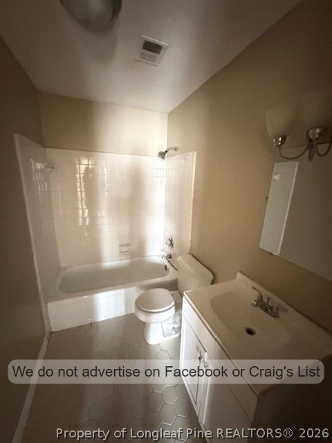 6471 Yadkin Road, Unit 17 Fayetteville, NC 28303 - Photo 5 of 9 a bathroom with a sink and a mirror