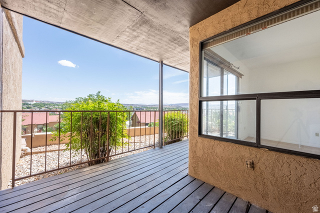 161 West 950 South, Unit C5 St. George, UT 84770 - Photo 9 of 14 Private balcony with wood-finish decking and metal railings