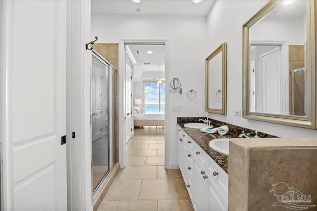a kitchen with stainless steel appliances granite countertop a stove and a refrigerator