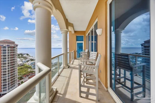 a view of balcony with furniture