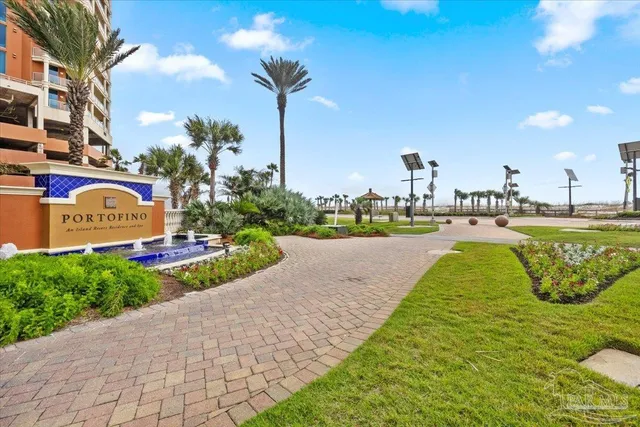 a view of a park with potted plants