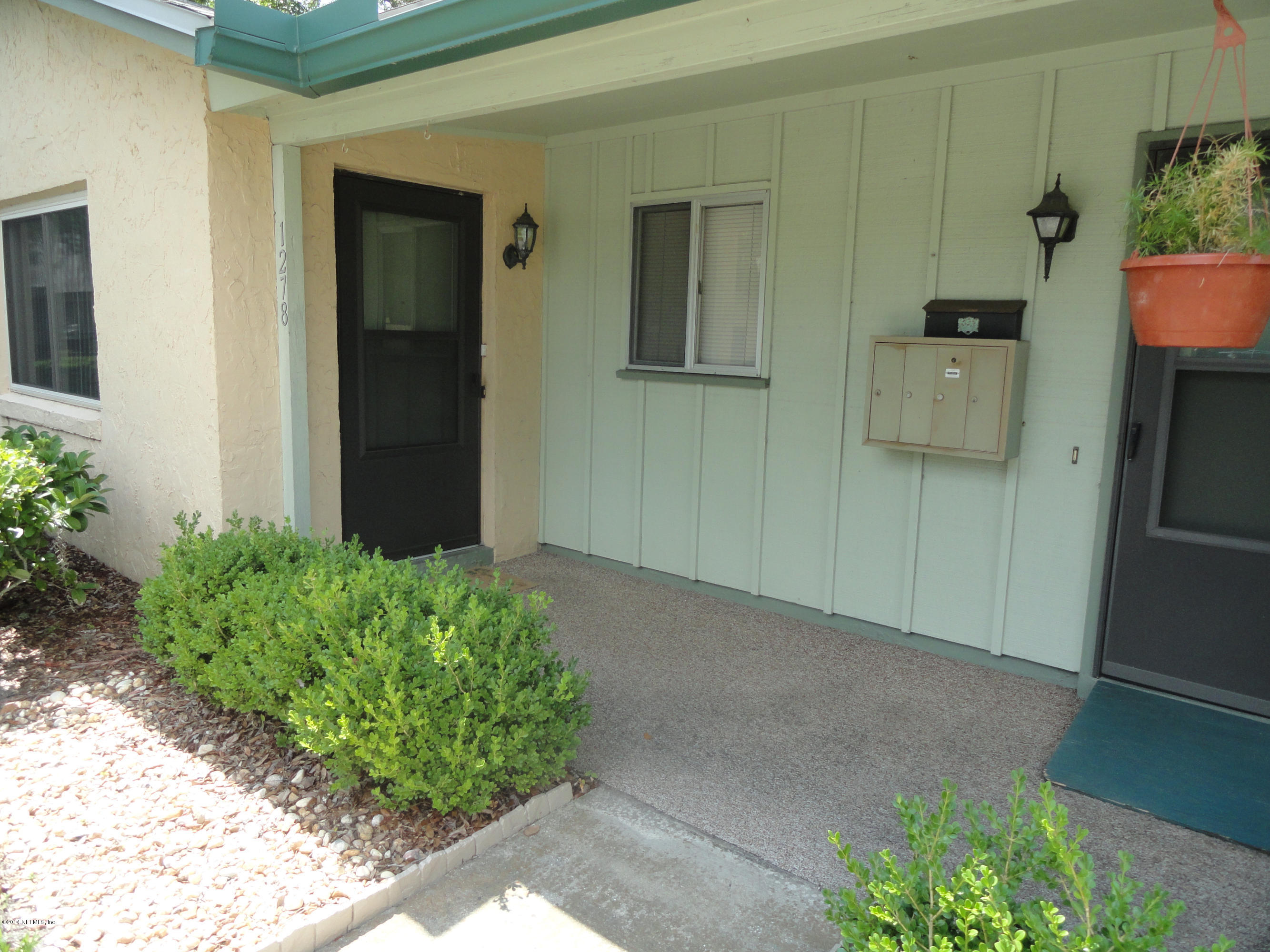 1278 The Grove Road, Unit 57 Orange Park, FL 32073 - Photo 3 of 31 COVERED ENTRY