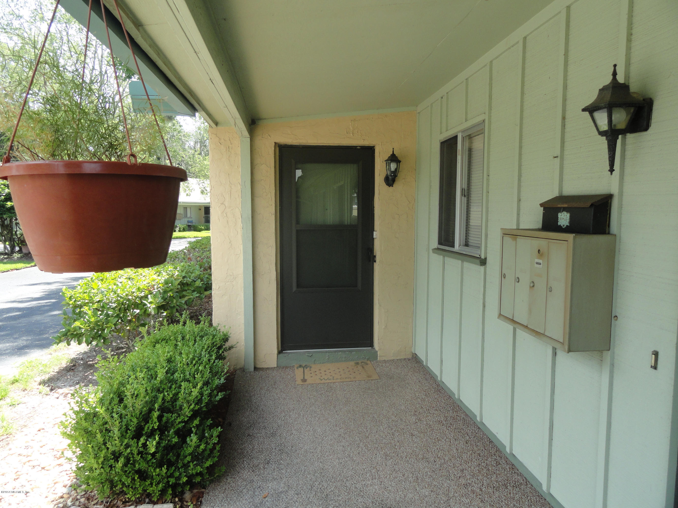 1278 The Grove Road, Unit 57 Orange Park, FL 32073 - Photo 4 of 31 COVERED ENTRY