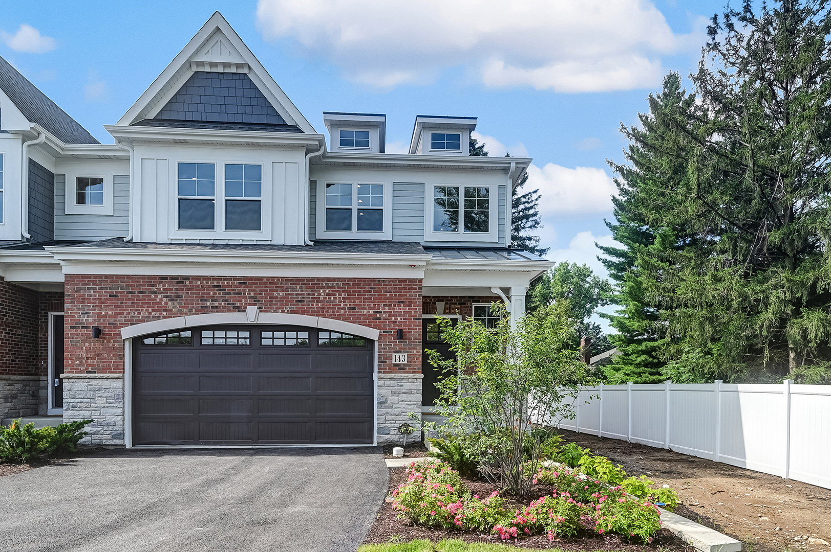 143 Harding Avenue Glen Ellyn, IL 60137 - Photo 1 of 40 a front view of a house