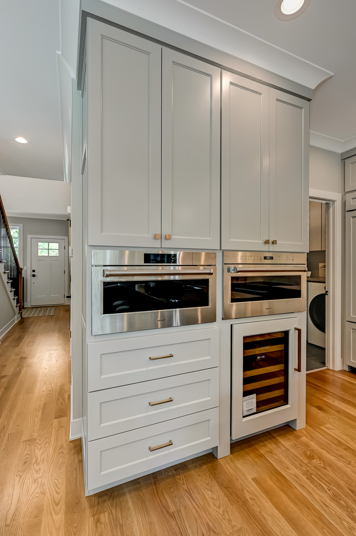 143 Harding Avenue Glen Ellyn, IL 60137 - Photo 11 of 40 a view of a kitchen with a sink and a stove top oven