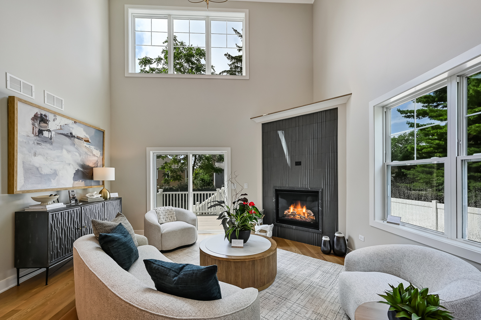 143 Harding Avenue Glen Ellyn, IL 60137 - Photo 12 of 40 a living room with furniture fireplace and window