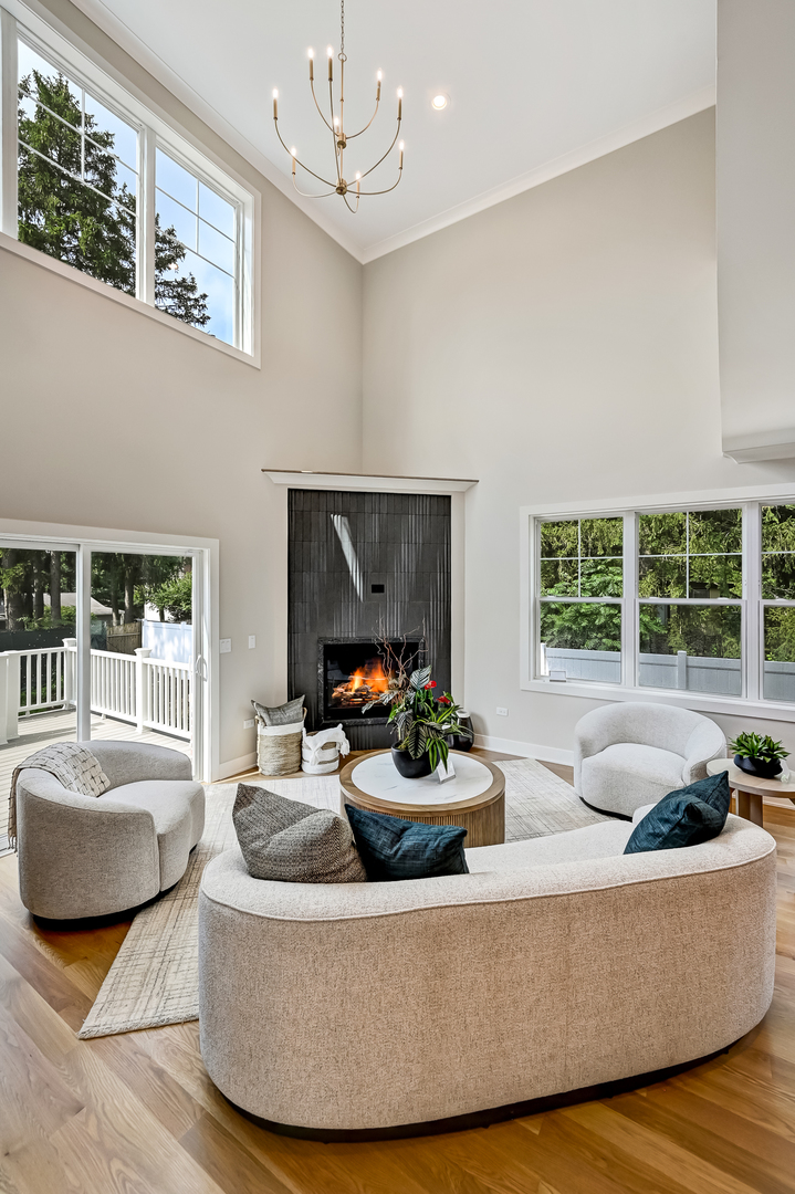 143 Harding Avenue Glen Ellyn, IL 60137 - Photo 13 of 40 a living room with furniture and a large window