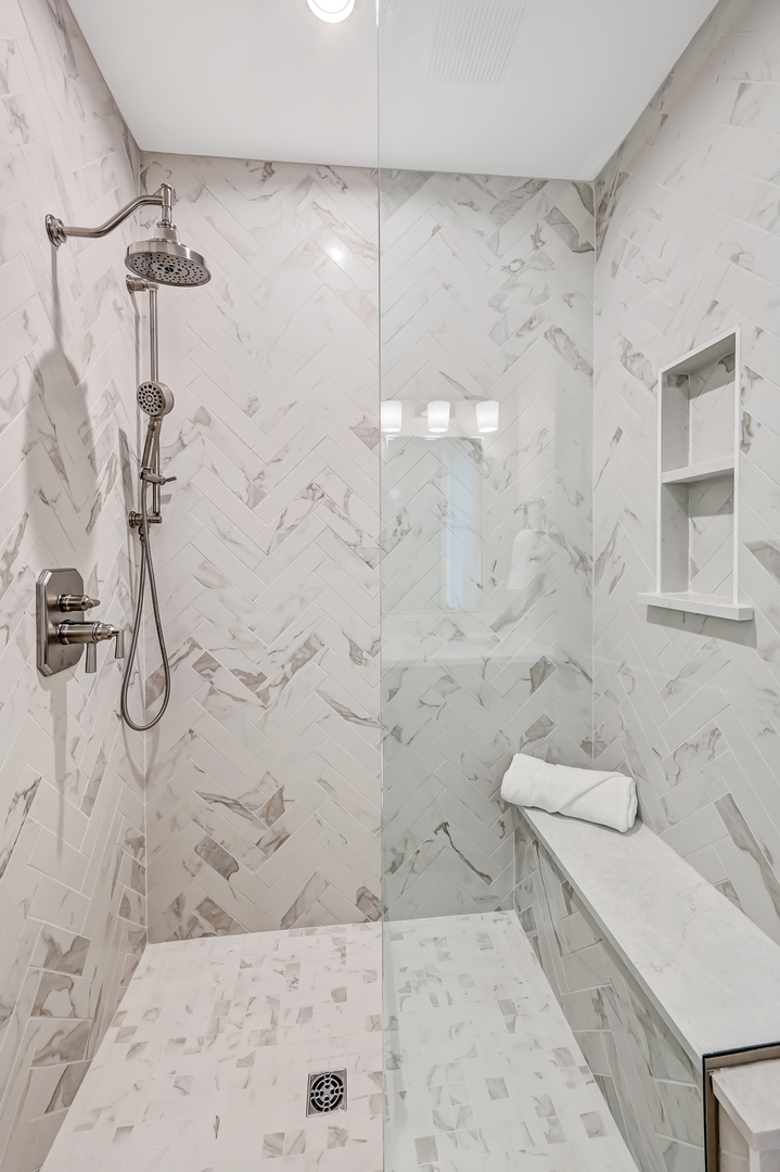 143 Harding Avenue Glen Ellyn, IL 60137 - Photo 22 of 40 a bathroom with a granite countertop shower and a sink