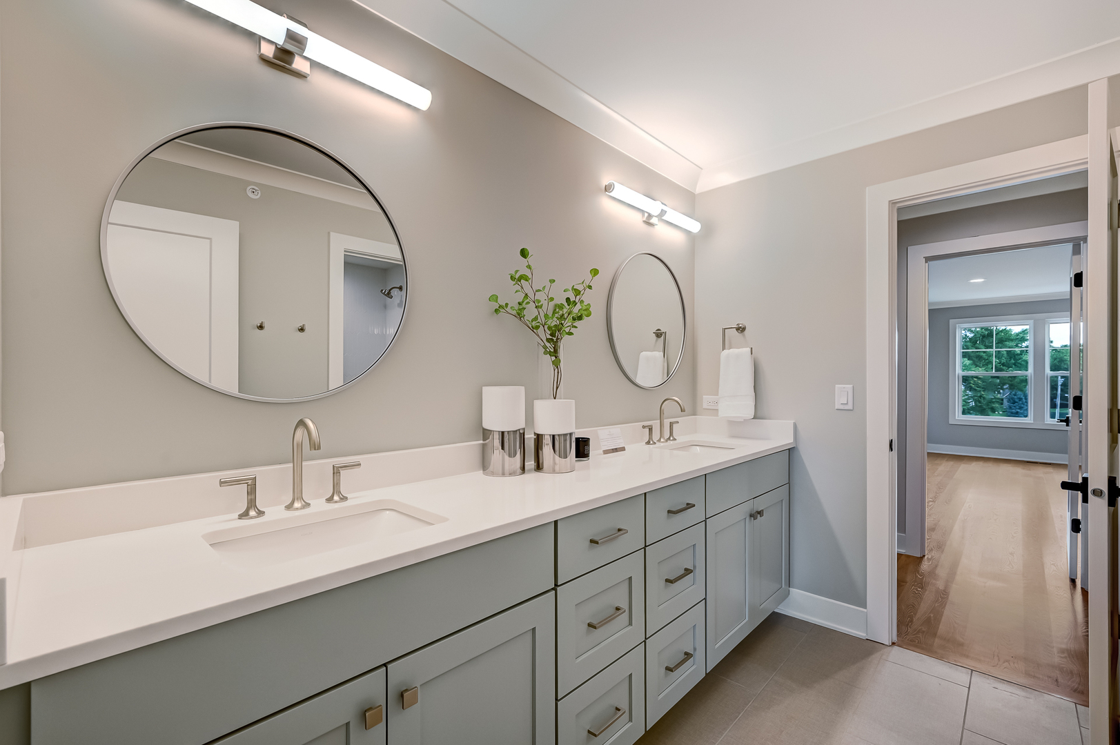 143 Harding Avenue Glen Ellyn, IL 60137 - Photo 28 of 40 a en suite bathroom with a double vanity sink double and mirror