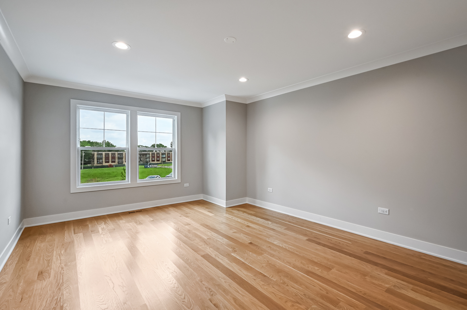 143 Harding Avenue Glen Ellyn, IL 60137 - Photo 30 of 40 a view of room with window and wooden floor