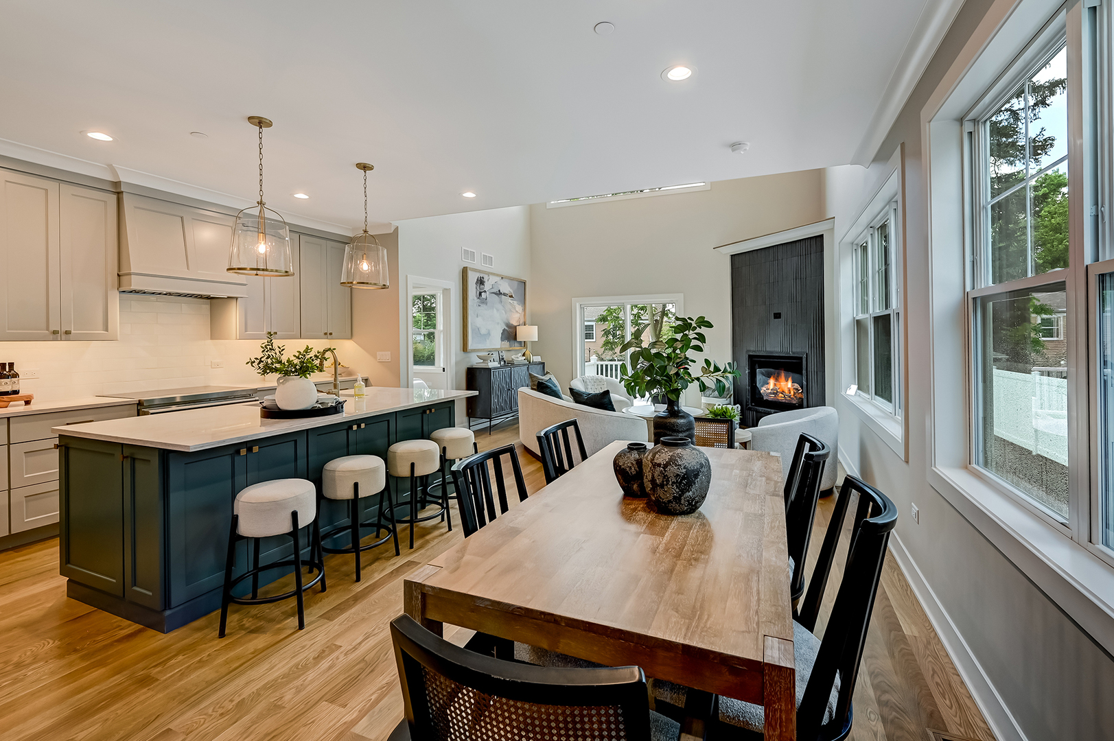 143 Harding Avenue Glen Ellyn, IL 60137 - Photo 6 of 40 a kitchen with granite countertop kitchen island stainless steel appliances a dining table and chairs