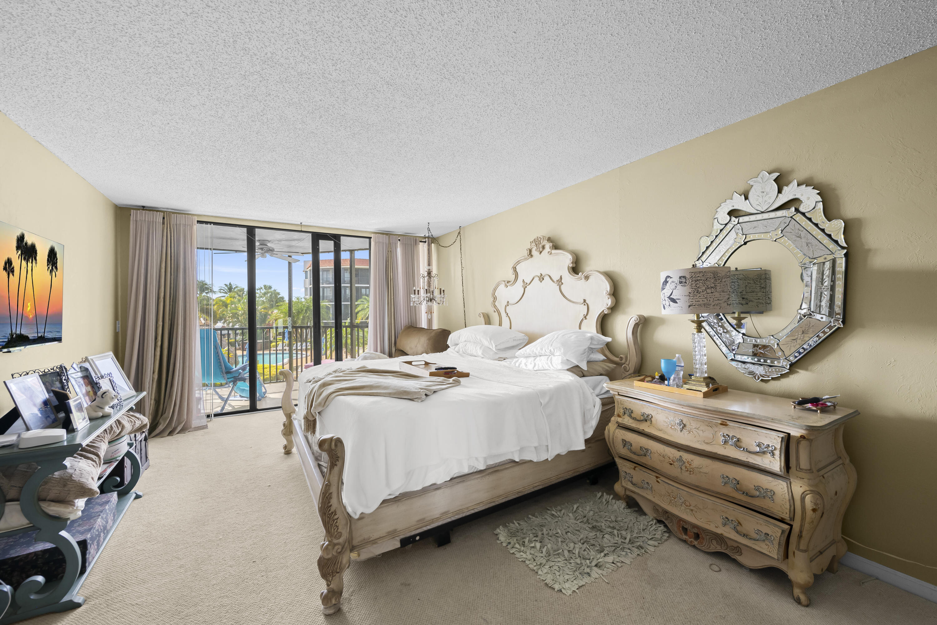 800 Jeffery Street, Unit 204 Boca Raton, FL 33487 - Photo 13 of 36 a spacious bedroom with a bed and a window