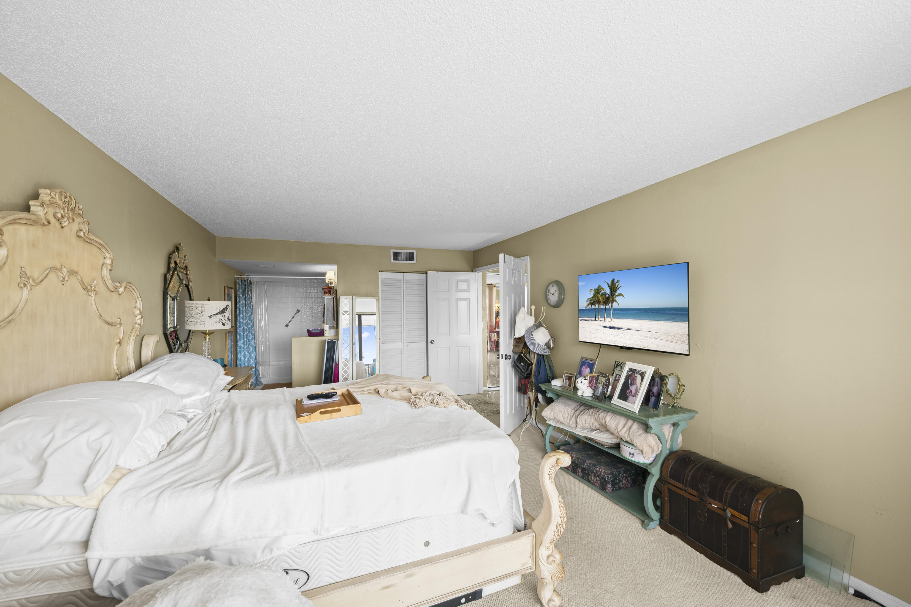 800 Jeffery Street, Unit 204 Boca Raton, FL 33487 - Photo 16 of 36 a bedroom with a bed and a couch