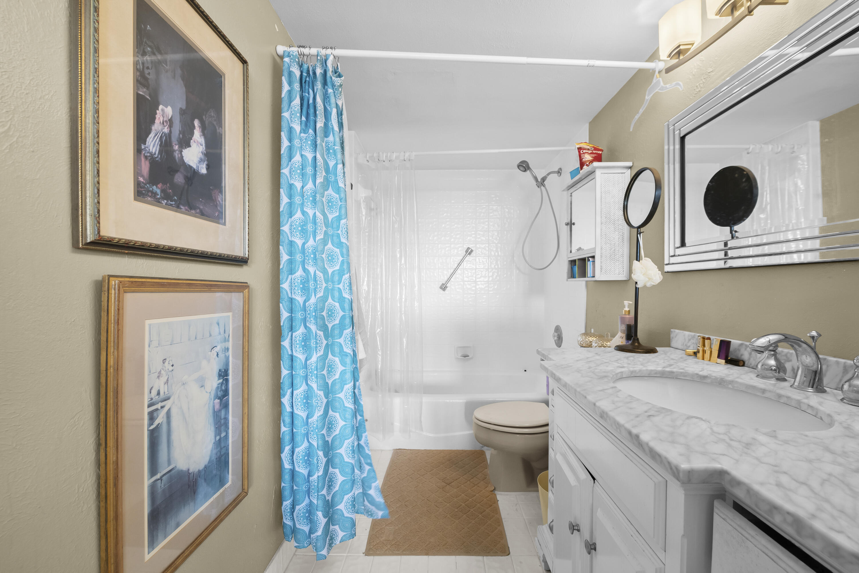 800 Jeffery Street, Unit 204 Boca Raton, FL 33487 - Photo 18 of 36 a bathroom with a granite countertop sink and a mirror