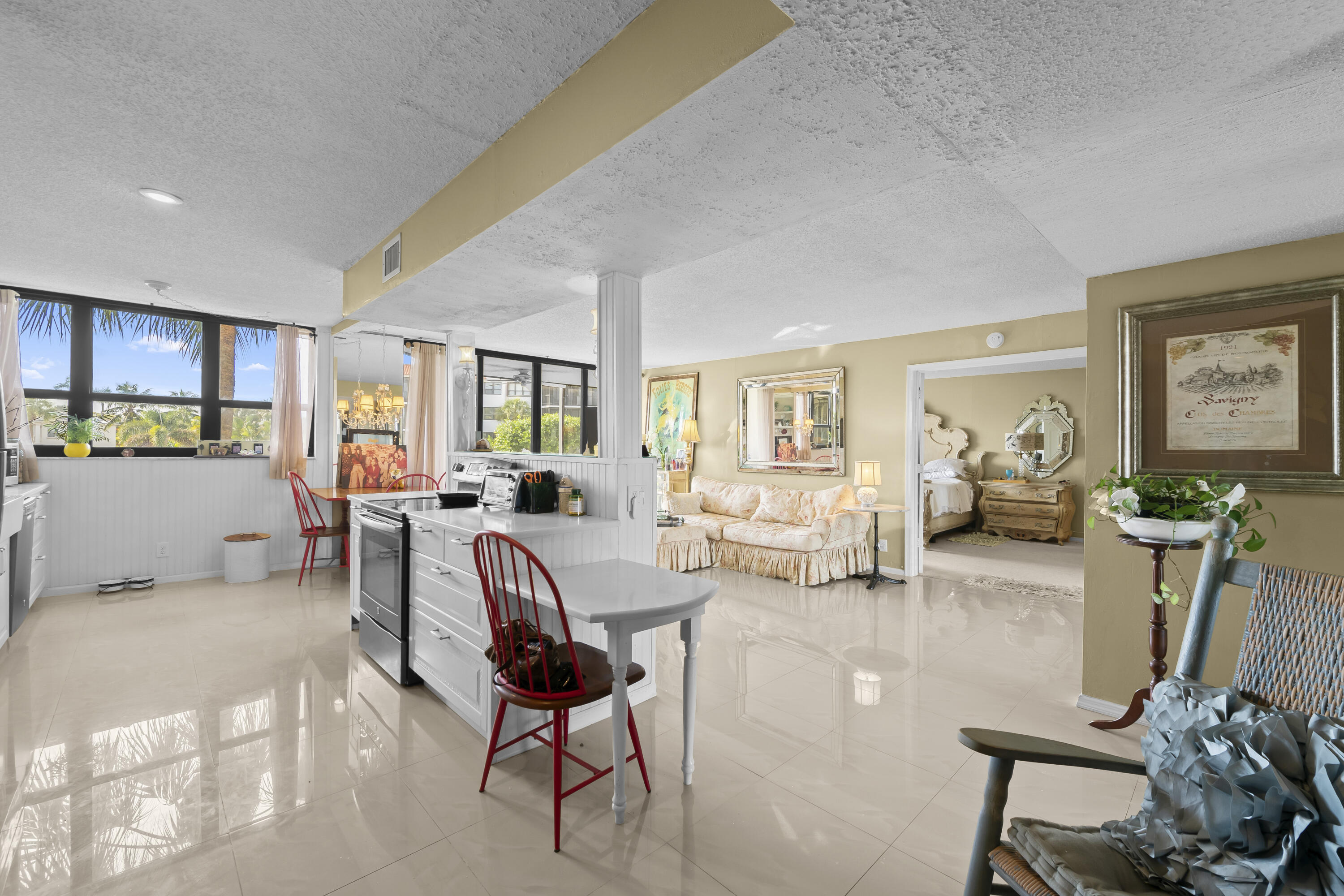 800 Jeffery Street, Unit 204 Boca Raton, FL 33487 - Photo 2 of 36 a living room with furniture and a wooden floor