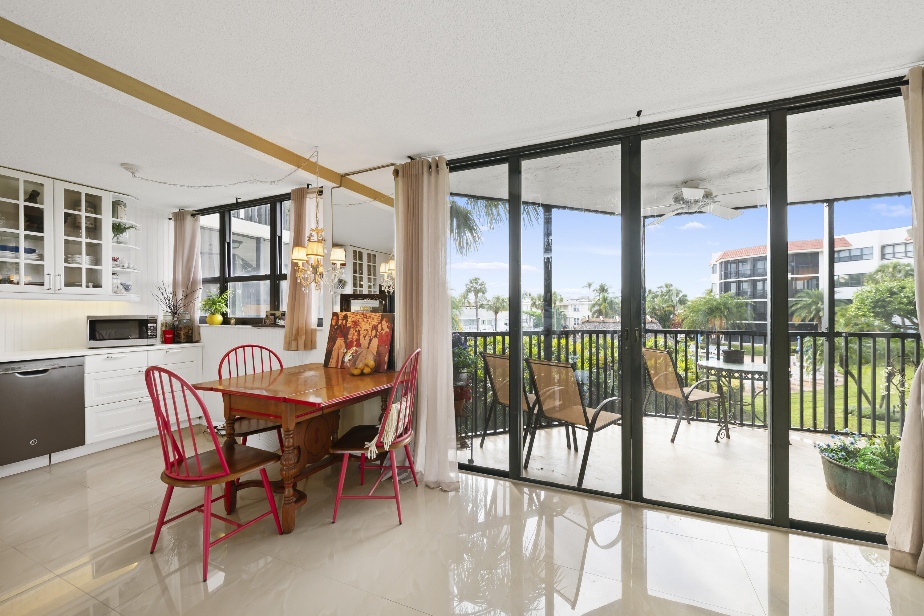 800 Jeffery Street, Unit 204 Boca Raton, FL 33487 - Photo 8 of 36 a dining room with furniture water view and wooden floor