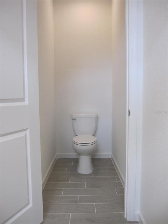 4530 Northwest 14th Loop Ocala, FL 34482 - Photo 27 of 40 a bathroom with a toilet