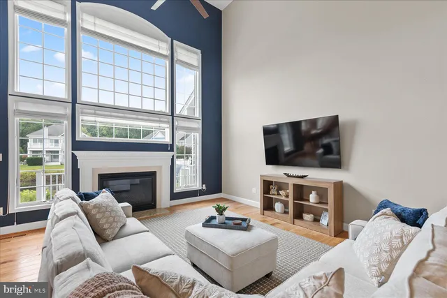 a kitchen with refrigerator cabinets and sink