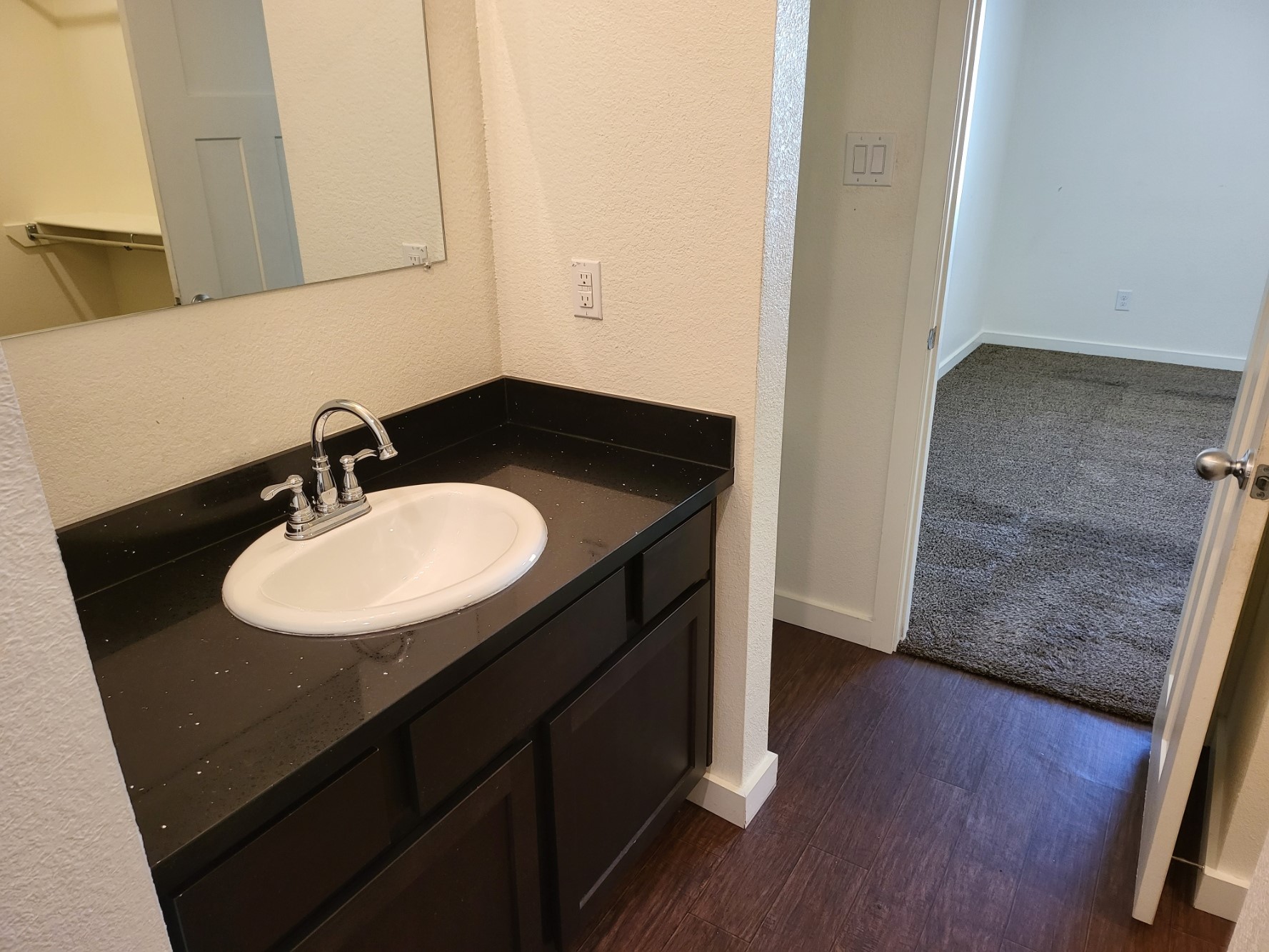 21155 Gosling Road, Unit 45B Spring, TX 77388 - Photo 14 of 33 a sink with wooden floor