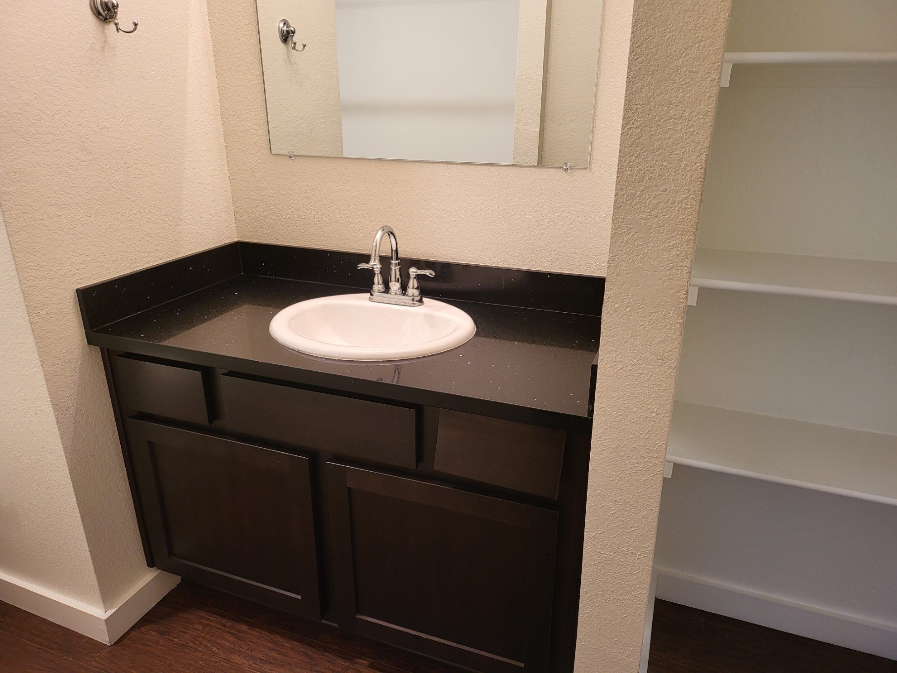 21155 Gosling Road, Unit 45B Spring, TX 77388 - Photo 17 of 33 a bathroom with a sink and a mirror