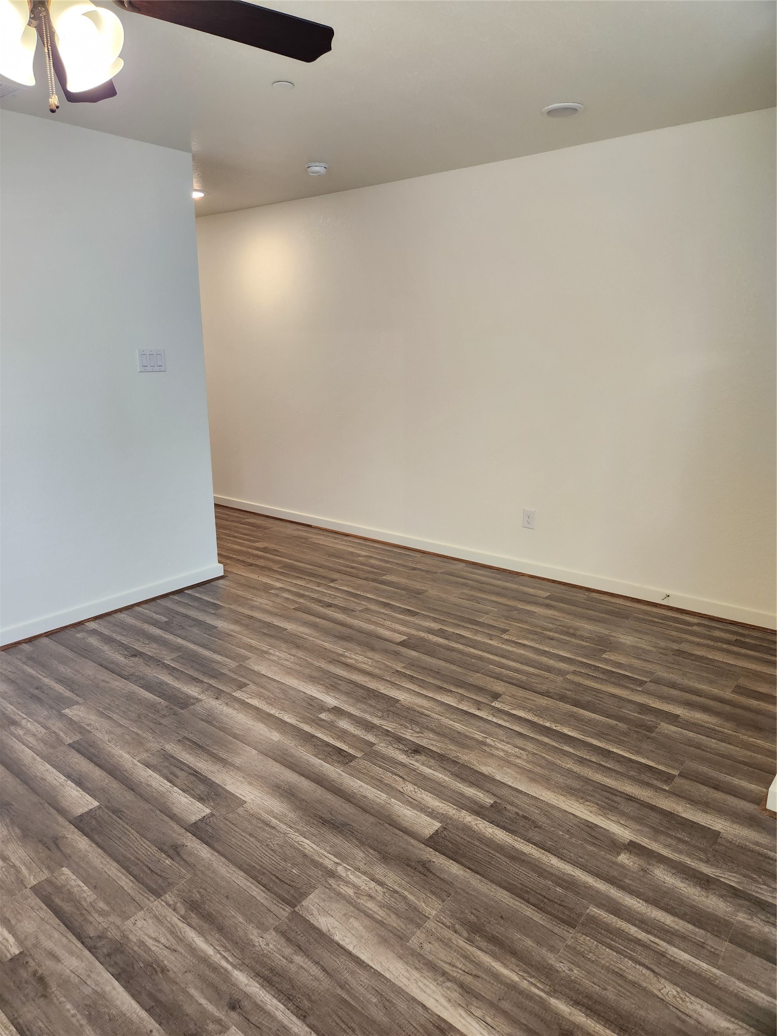21155 Gosling Road, Unit 45B Spring, TX 77388 - Photo 6 of 33 a view of an empty room with wooden floor