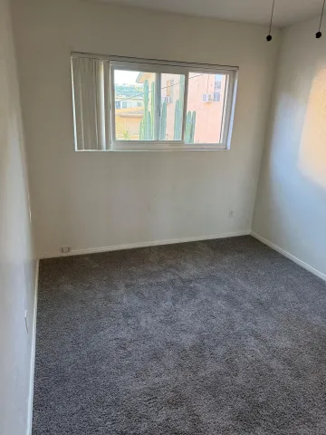 an empty room with a window