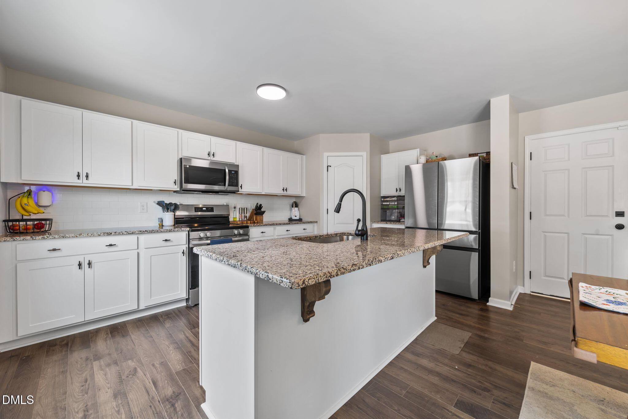 174 Cobra Lane Raeford, NC 28376 - Photo 10 of 32 a kitchen with appliances a sink and cabinets